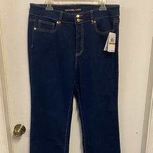Up for sale is a pair of Michael Kors denim jeans.